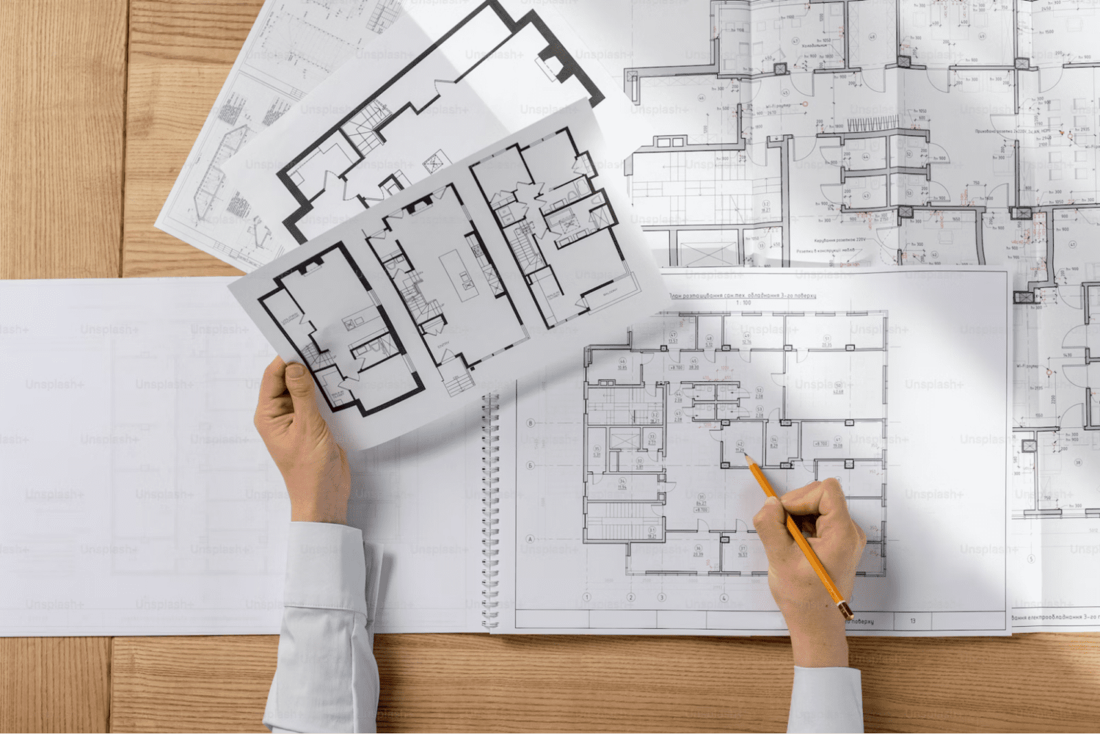 An architect develops architectural floor plans