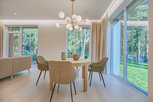 A dining room addition with large windows