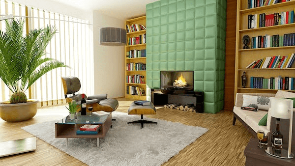 A room addition with a fireplace and bookshelves