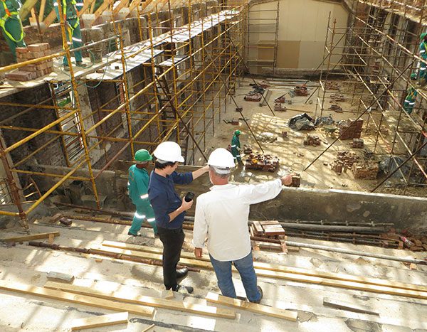 A construction crew working to construct a sturdy building